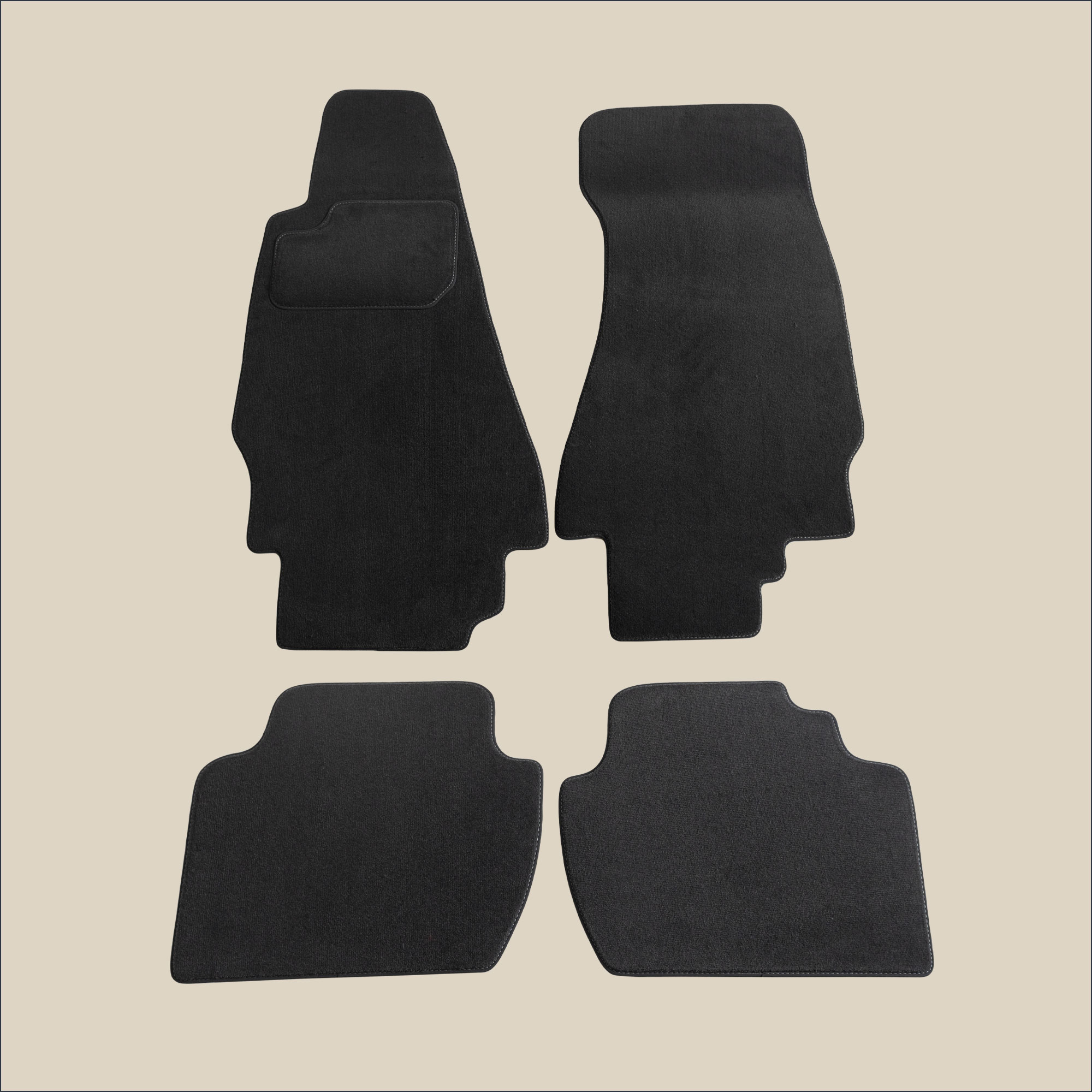 tapis surpiqure gris aston rapide